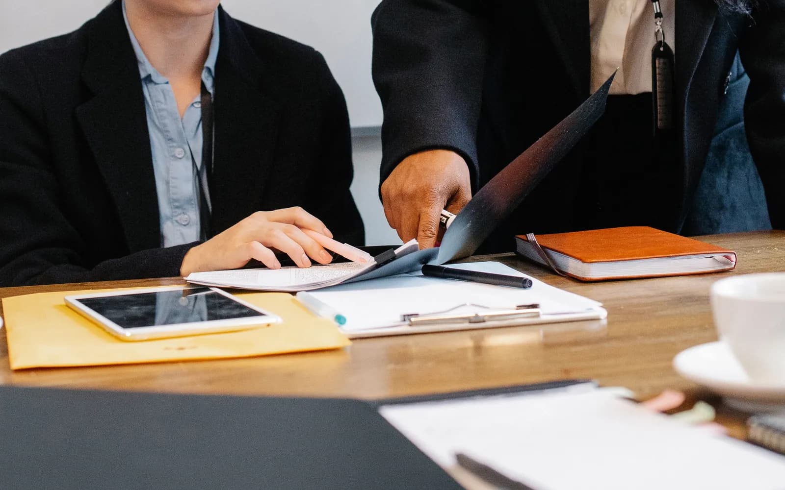 An implementation team defining fields, permissions, and failure handling together