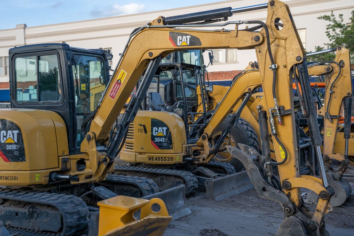 An equipment service team reviewing a customer rental request